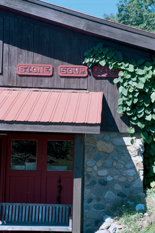 The stone walls extend six feet high, and the second story was constructed from fir two-by-fours. Kate made the signs declaring the property’s name, Stone Soup Farm. “Because we didn’t have a big construction and building budget, we made a lot of choices that had to do with what we had at the time,” Kate explains. “It was a lot like that great old folk story: a little bit of this and a little bit of that, but making it all out of stone.”